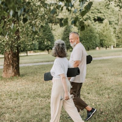 Close-up of a yoga mat and a water bottle in a calm setting.